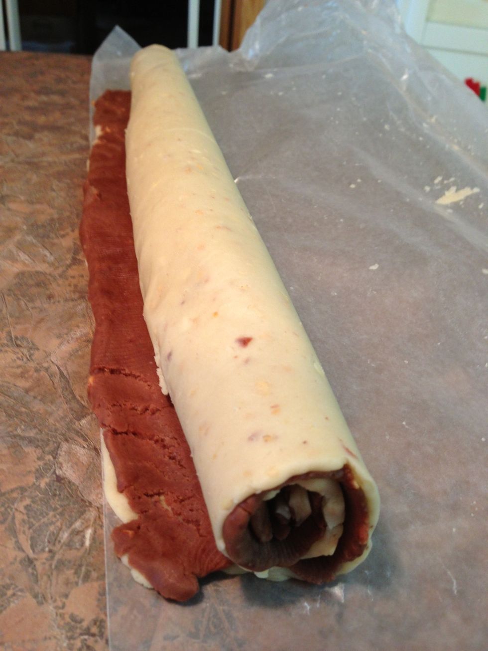 The ends always look messy but inside you have a perfect pinwheel... You will see later, when you slice. Cover with one of the sheets of wax paper to keep moist & refrigerate 4+ hours.