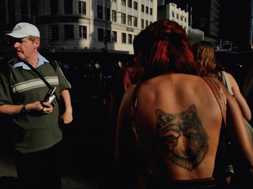 The exposure is locked so that the tattoo is isolated, which adds to the impact of the final image. The exposure was locked before the image was framed (Image copyright Oliver Lang).