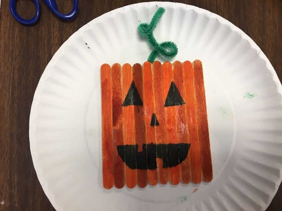 The final step is to draw your pumpkin's face.