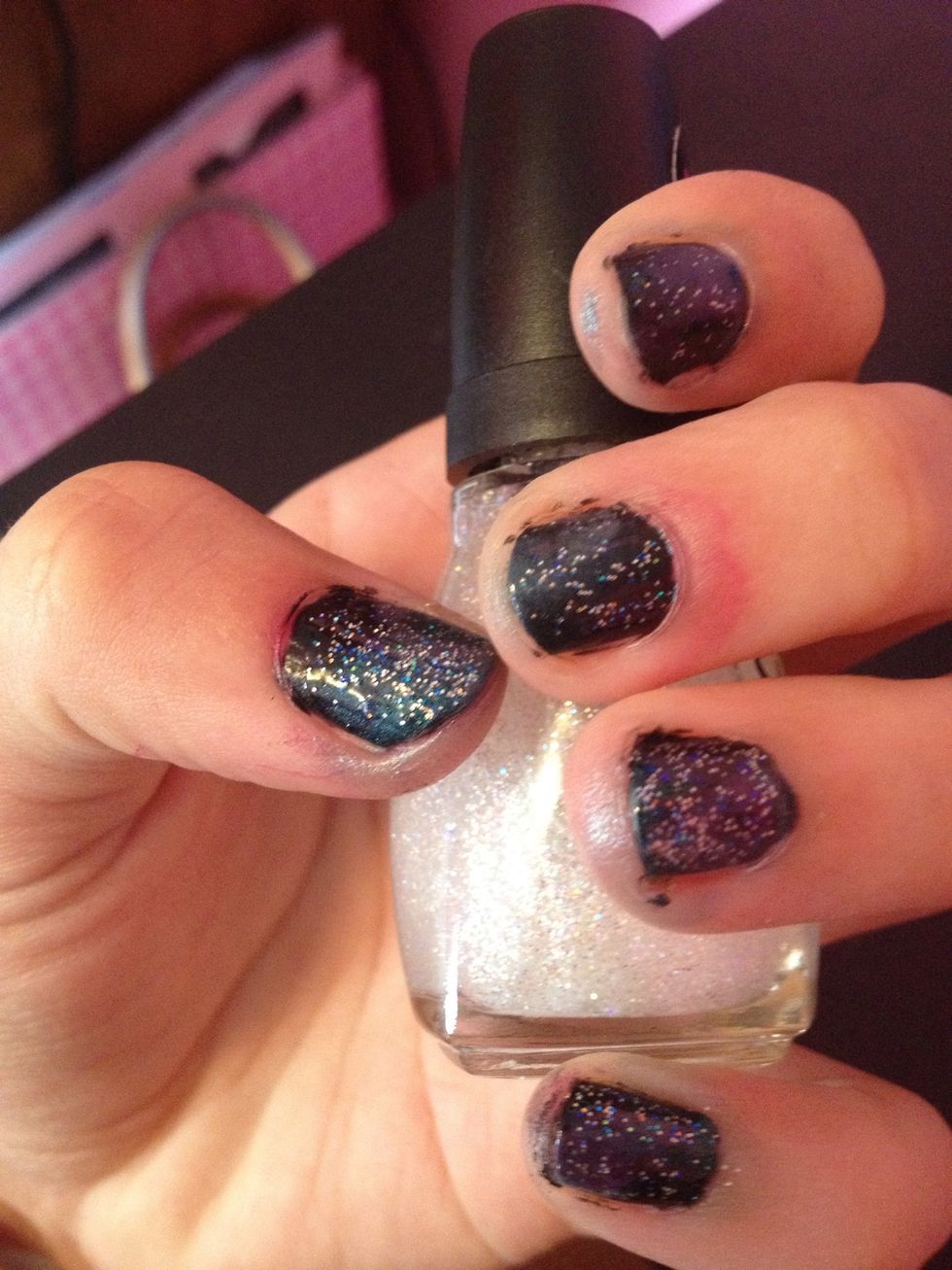 The fine milled glitter I used is Spoiled by Wet n Wild's "Shaken Snow Globe (S002)". This gives us our "galaxy stars".