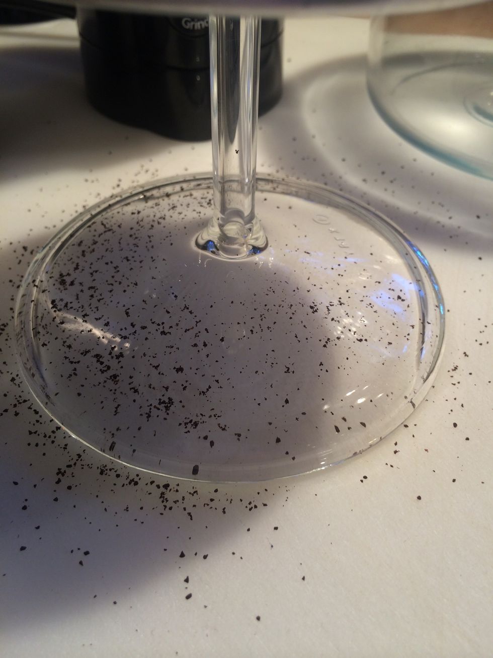 The finer ground coffee will drop out of the brew basket. This is ok, tap the brew basket lightly to shake loose more fine ground coffee. That's why course ground coffee works well with this pot.