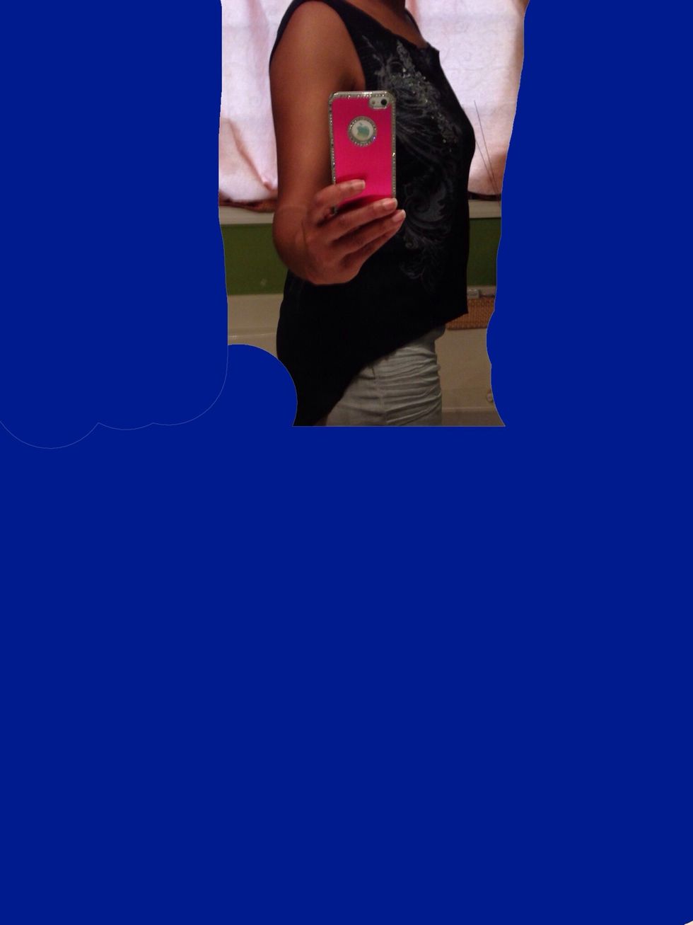 The finished shirt with the high/low concept. You can cut the cropped part higher than i did, which I'll probably do since I didn't jack it up the 1st time!! \ud83d\ude04 Thanks for watching!! \ud83d\udc4b