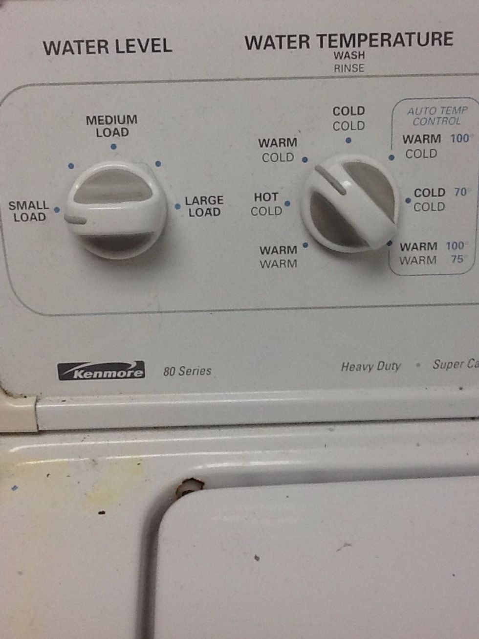 The first button is to tell what size of load you got. The second button is the temperature of the water.