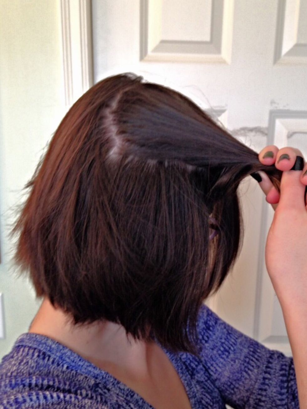 The first hairstyle is a side braid, so take a small section of your hair like this.