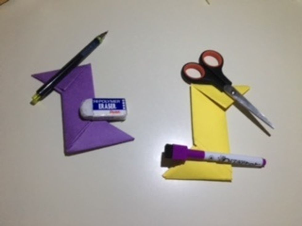 The first piece should look like a Z and the second should look like a S. If you end up with a L, make sure you folded the right corners on to each other.