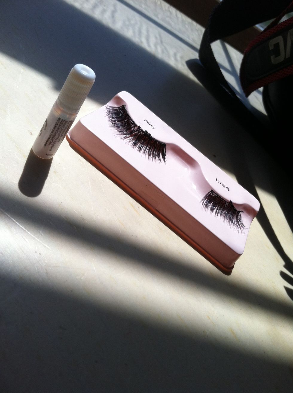 The first product I got were the Kiss "Looks So Natural" Lashes in Flirty. (these have already been cut to fit my eyes). These are full size and retail for $3.99.