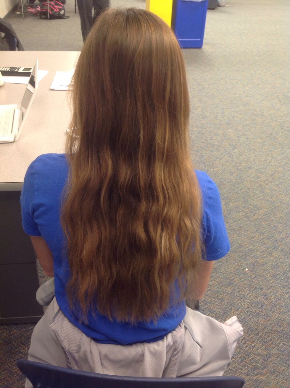 The first step in braiding hair is to make sure the persons hair that you are braiding is combed out. Make sure all the knots are out You should be able to run your fingers through it smoothly.