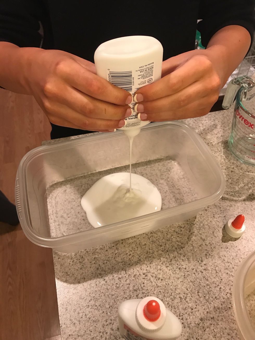 The first step is to gather your materials needed. Once you have your materials pour 1/2 cup of glue into a large mixing bowl.