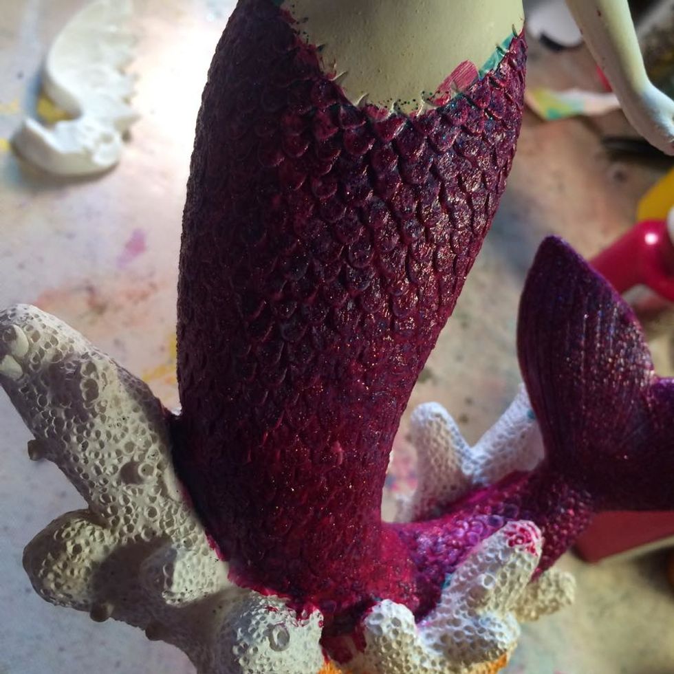 The first thing I did was brush her tail with Rhodolite. I LOVE the color effect with the blue color that was originally on the mermaid.