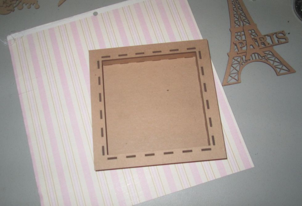 The first thing that I did was to assemble the shadow box so that I was certain to have all of my pieces in the correct spot.