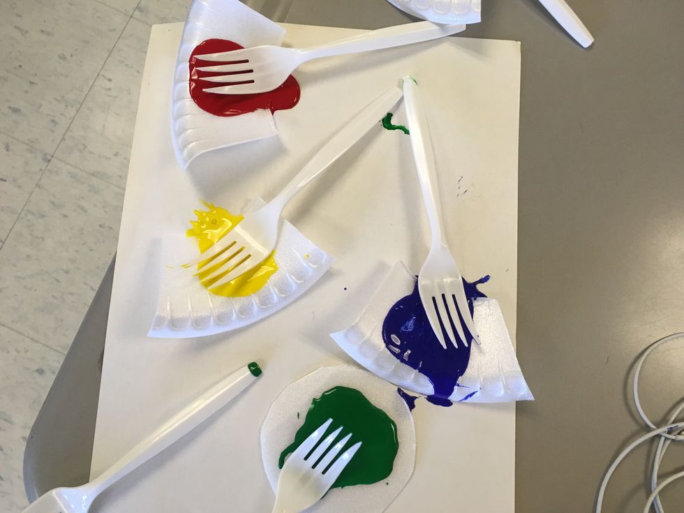 The first thing you have to do is dip the top of your fork in the paint.