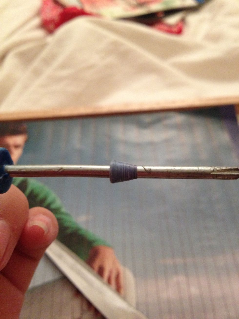 The first triangle was just to get the others to align properly; you can discard that one. Or make an awkward little bead...