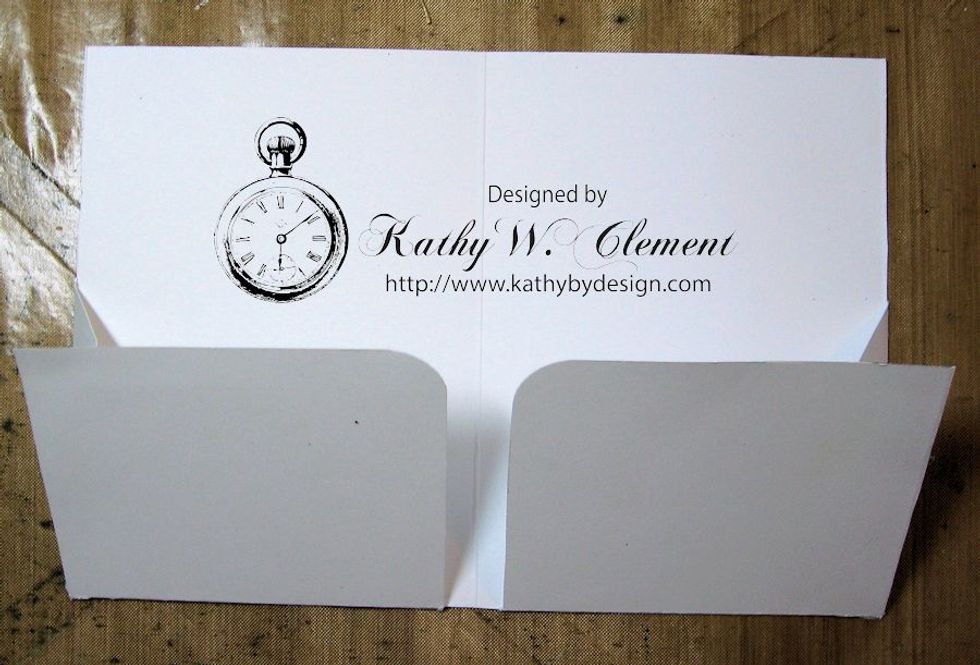 The flaps on the bottom will fold up to form pockets. But don't glue anything together until after you have lined your inside.