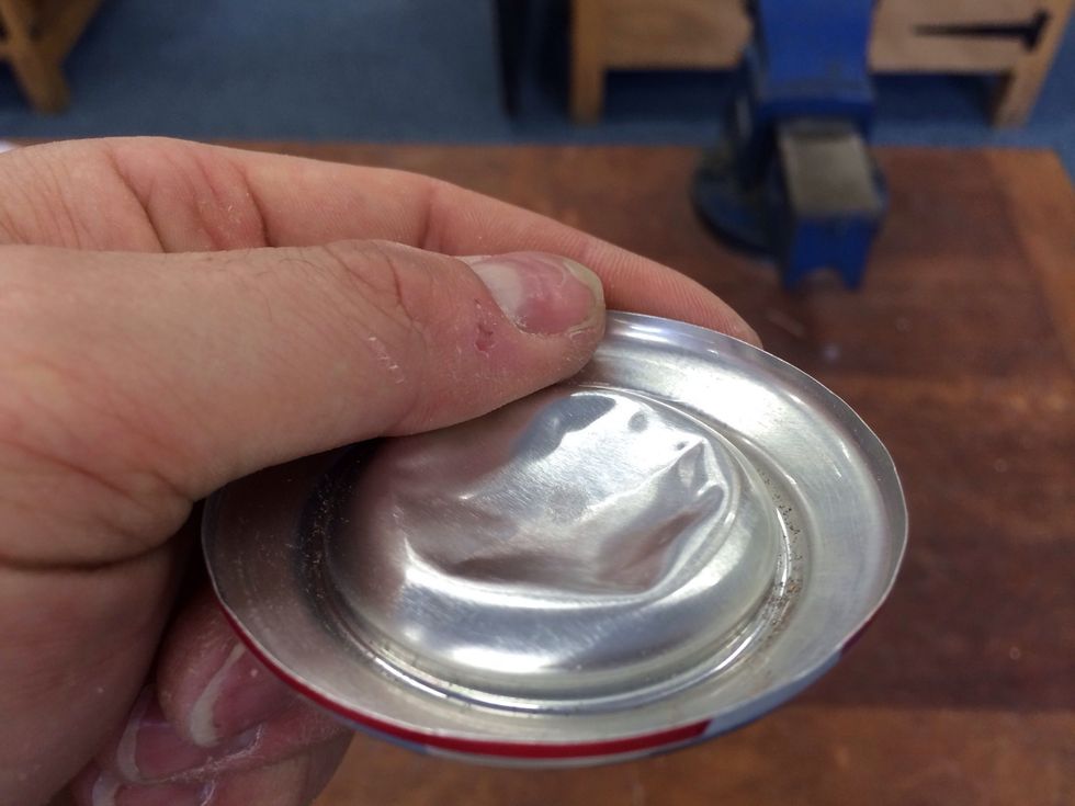 The flattened bottom will allow the MDF to sit inside the lip of the can.