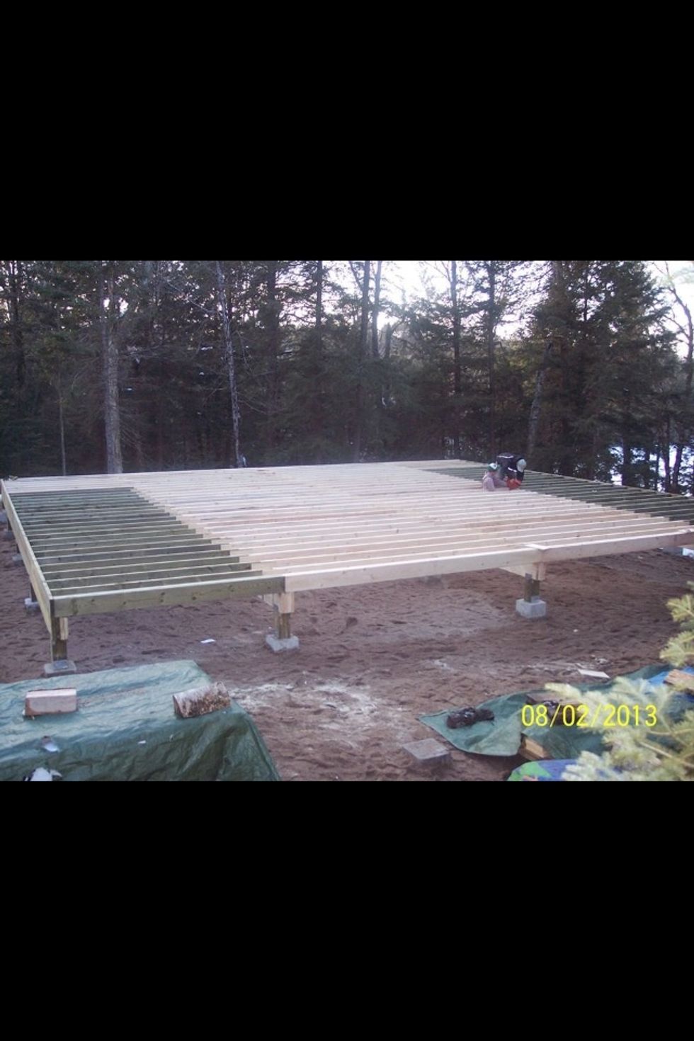 The floor joist's are 36x40 ft. The green pressure treated wood is for the decking.