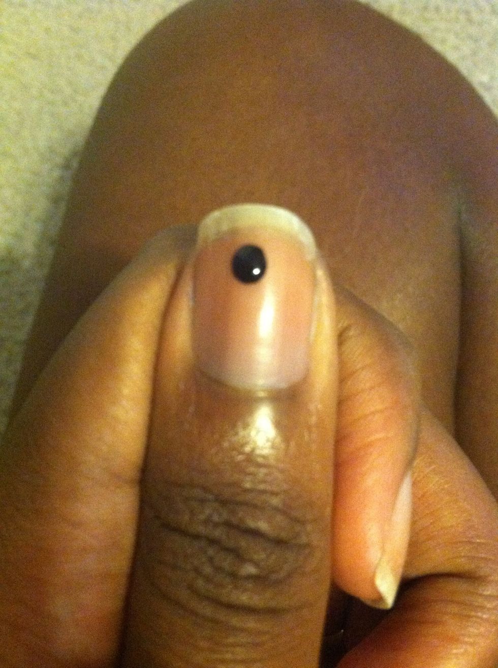 The flower will consist of 5 dots, so make the first one at the top like this\u2b06.