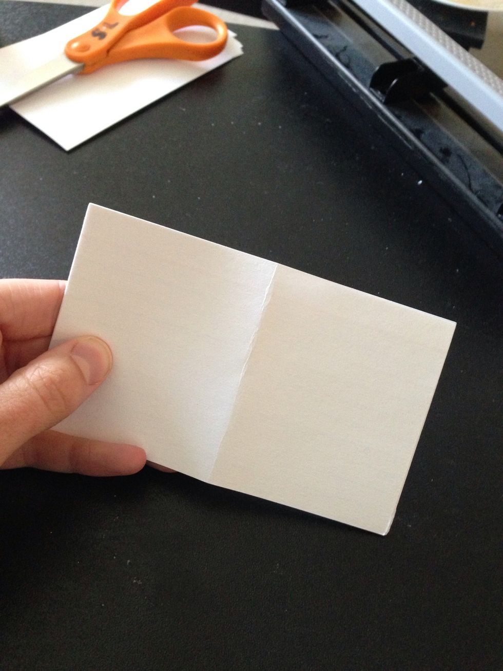 The fold gives you a guideline of where to cut with the scissors.