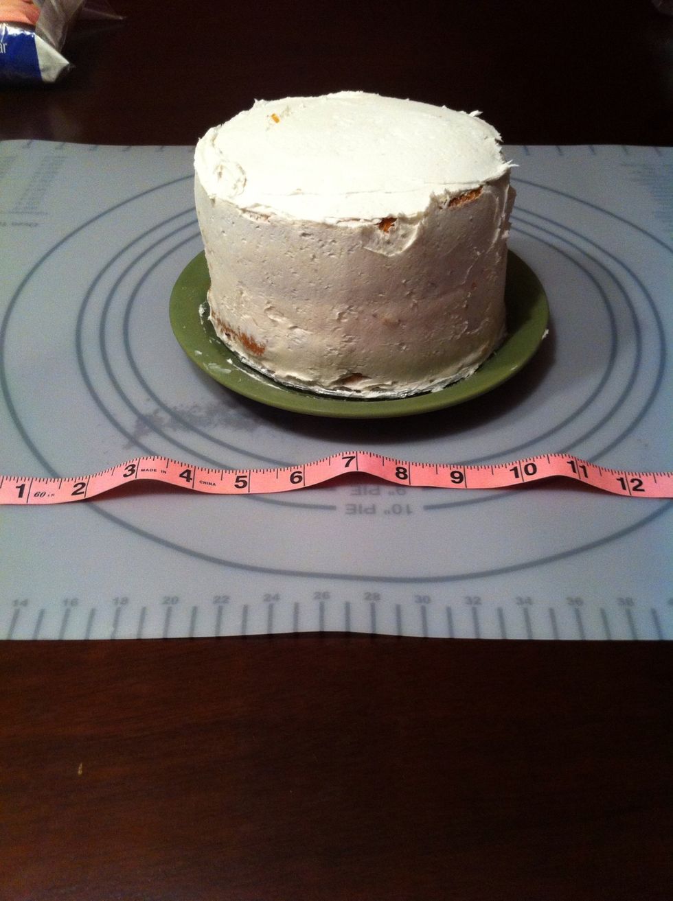 The fondant will stick. Be sure to keep moving it. Before I began with the fondant, I measured each cake to get an exact measurement. I didn't want to get the fondant to the cake and it was too small.