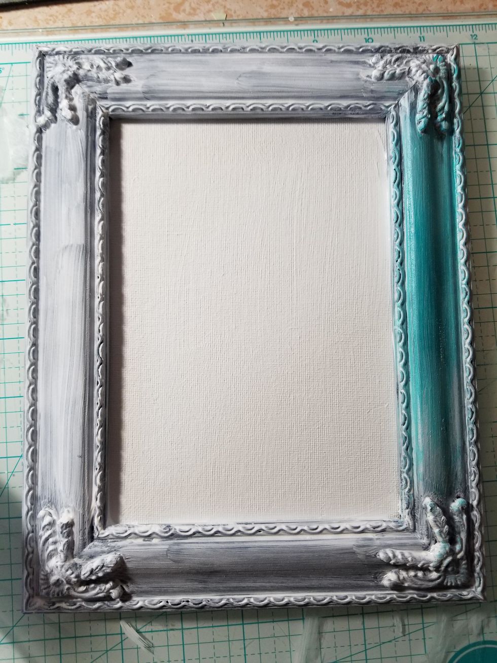 The frame I chose was black so I first gessoed in white. About three coats. let dry.