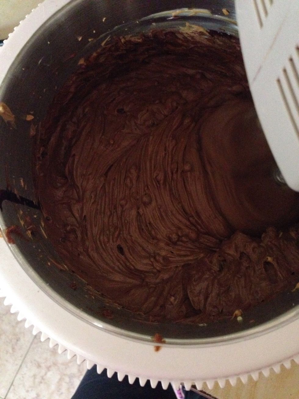 The frosting should have a dark chocolate color