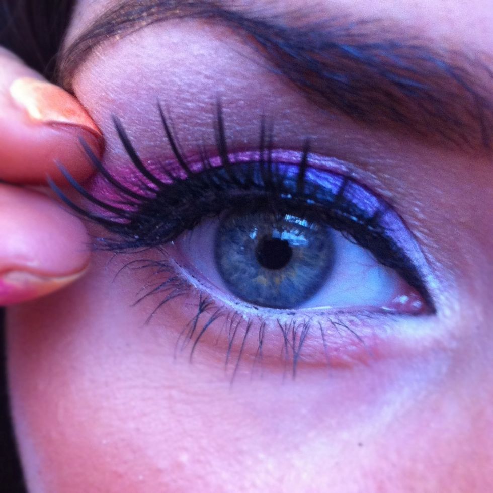 The fun part! Cut your false lashes to your eye shape, flex them and apply the glue to the strip, let the glue get tacky! Finally apply to your natural lash line.Apply wo coats of mascara!