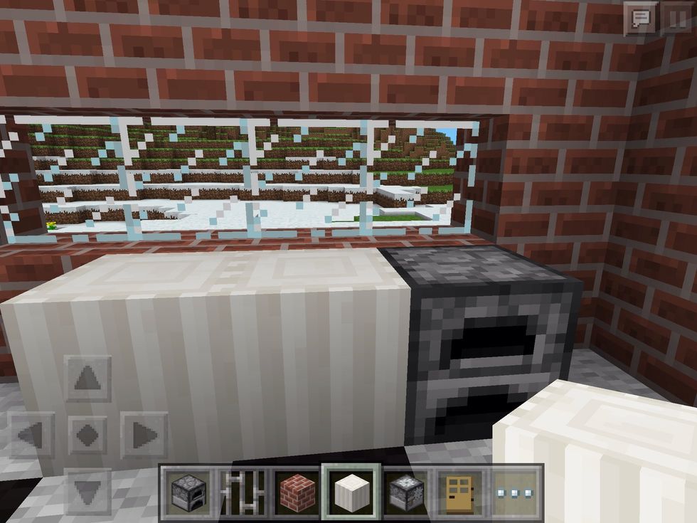 The furnace is the natural choice for an oven. To the left, we have Pillared Quartz blocks for counters to prepare your meals!