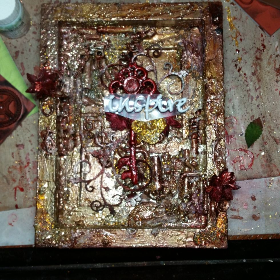 The gold flower and the red key did not have enough depth, so i added a word, stickers, and more red flowers. to the cluster.