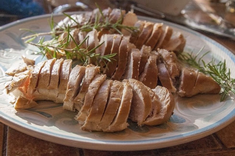 The great thing about this recipe is that it makes excellent chicken for sanwiches and salads, and it can be made ahead and packs up perfectly for cookouts, potlucks, and picnics.