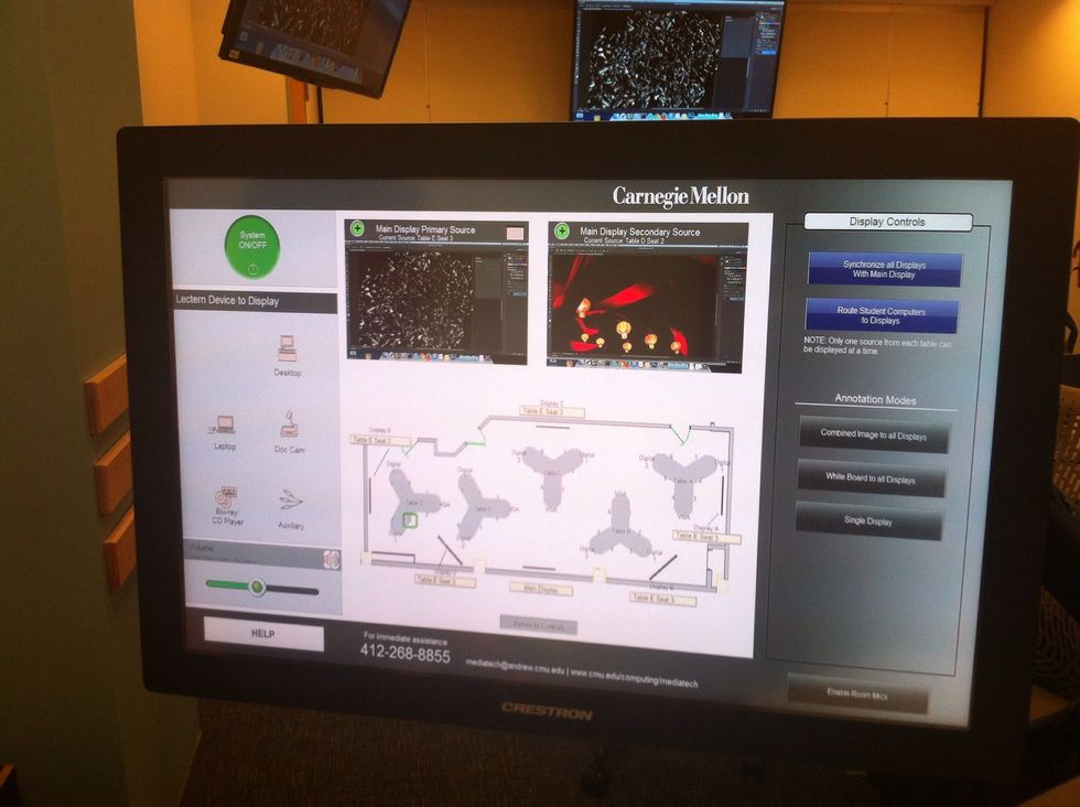 The grey student seating chart allows you to select up to two student desktops to display. A student's desktop can be displayed alongside the primary source.