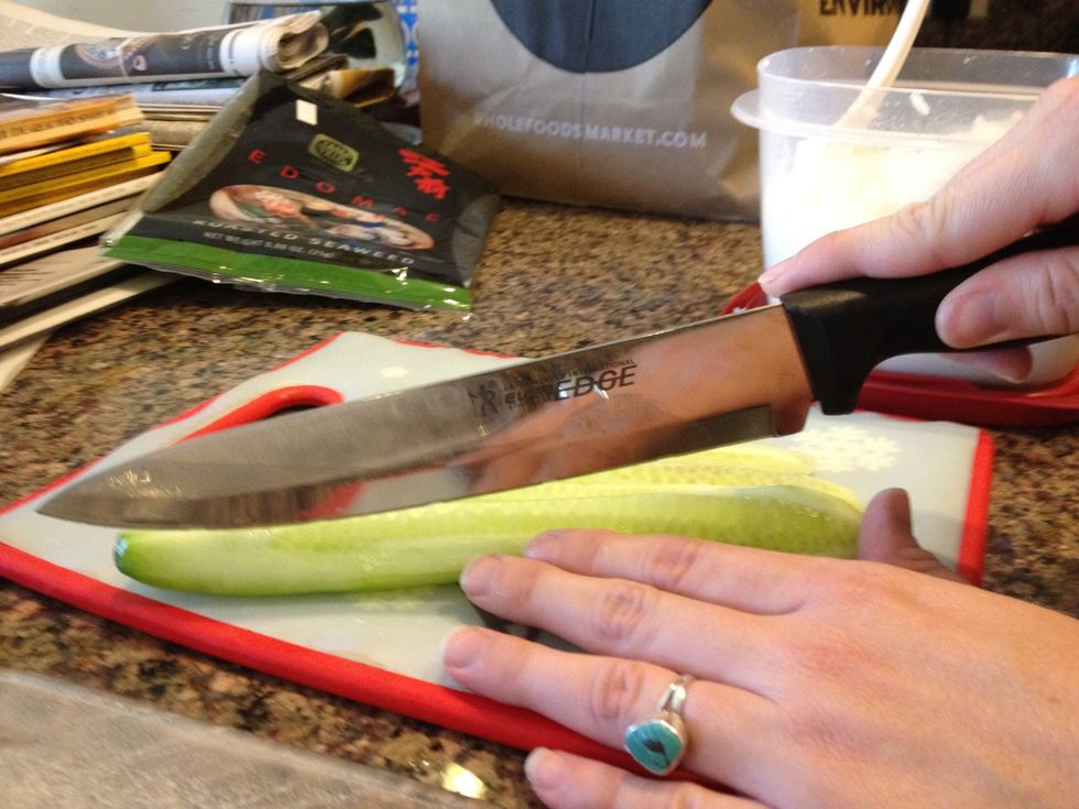 The grown-up can slice the cucumber into thin strips...