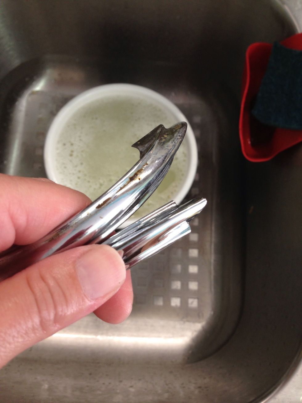 The gunk comes right off with the toothbrush and some elbow effort. (Can't say grease cuz that's what we're trying to remove here)!