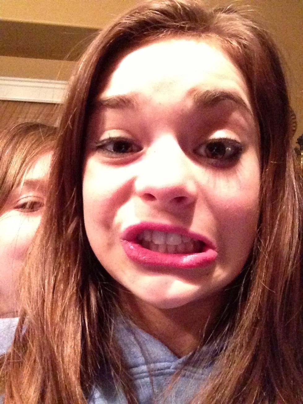 The "half my lip doesn't smile and the other has trouble too" smile.