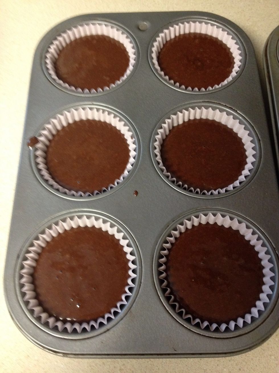 The half recipe made eight cupcakes.  Now stick into the oven for 18-20 minutes.  These only took 18 minutes to bake