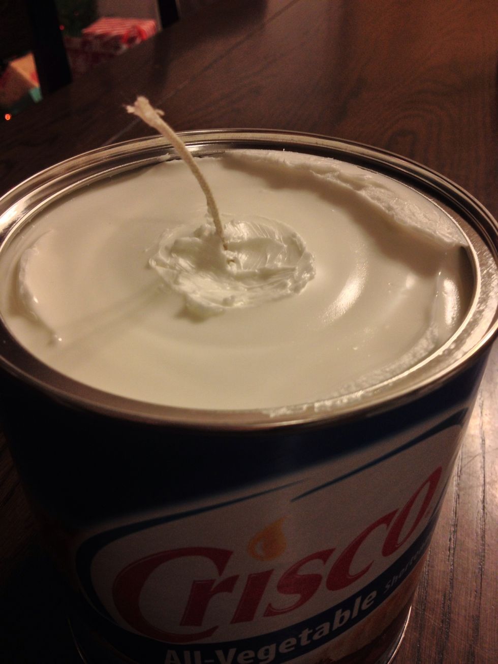 The hole might seem a bit big but don't worry about this. It fills in naturally and when you burn. Smooth the top area around the hole with your finger and lock the wick in place.