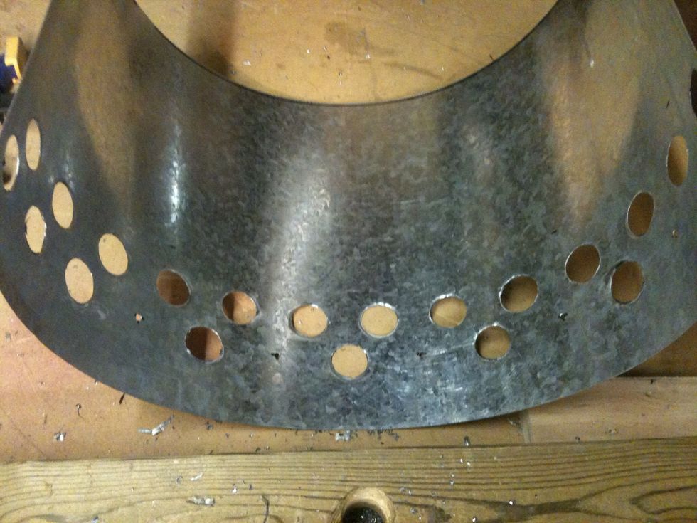 The holes are done. The bottom row I decided to drill every other hole. After I finished I realized that I should have put another row of holes at the bottom. Centers would be 1.25 from the bottom.