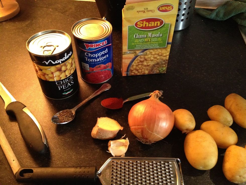 The ingredients. The mini grater is ideal for ginger. Tinned chickpeas are fine, unless you fancy soaking and boiling from scratch. You can pick up Chana Masala powder from most stores.