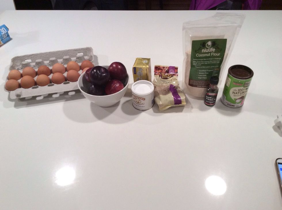 The ingredients you need are plums, eggs, backing powder, hazelnut or almond meal, butter, coconut flour, vanilla extract and stevia.
