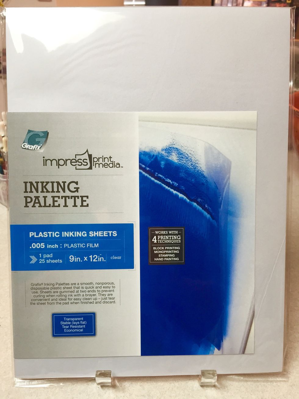 the Inking Palette from Grafix has 25 disposable plastic sheets, separated by white paper. the sheets are anchored at each end of the stack keeping the palette stable during use.
