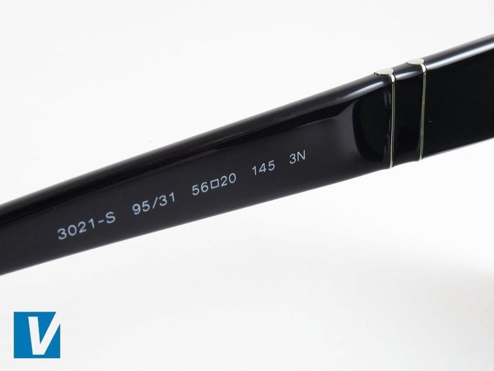 The inside left temple arm of new Persol sunglasses detail the model code which is 3 or 4 numbers followed by a letter. Also featured is the size information which is two separated numbers.