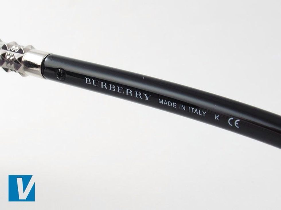 The inside of the right temple arm of Burberry sunglasses feature the Burberry name followed by 'Made in Italy'. Newer models will also feature a single letter followed by the letters CE.