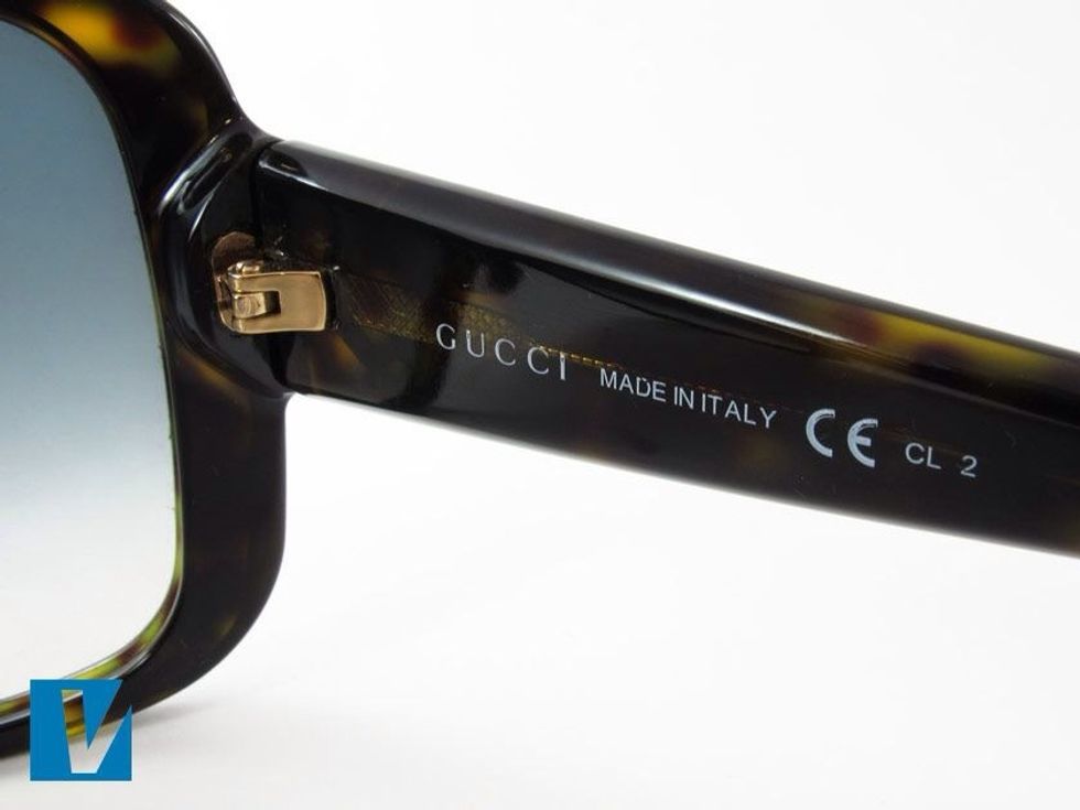 The inside right temple arm of Gucci sunglasses feature the Gucci logo, followed by "Made in Italy", and the letters CE representing European Conformity.