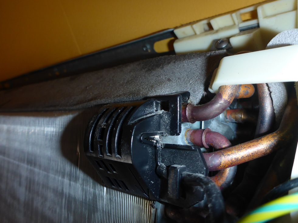 The intake air temperature sensor pulls allmost straigth off. Just wiggle a bit and pull gently.