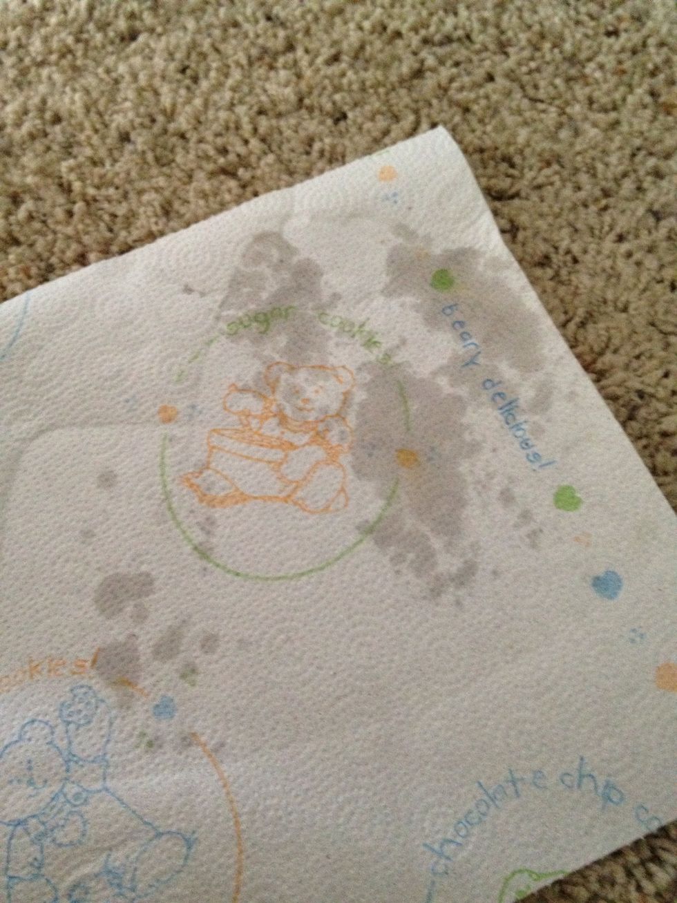 The iron heats up the wax that gets absorbed by paper towel. Repeat as often as required. Rotate towel for max. effect.