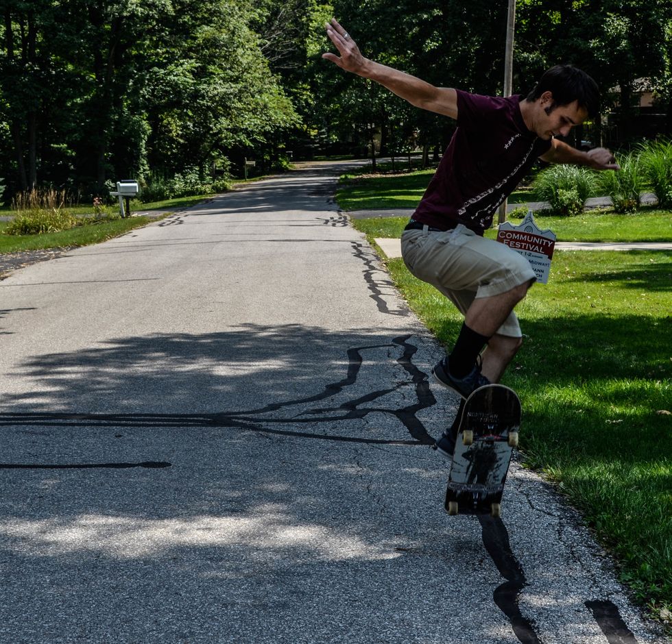 "The jump" is the third step to the Ollie. With the tail hitting the ground and the front foot moving forward, a jumping motion is needed to make the board lift from the ground.