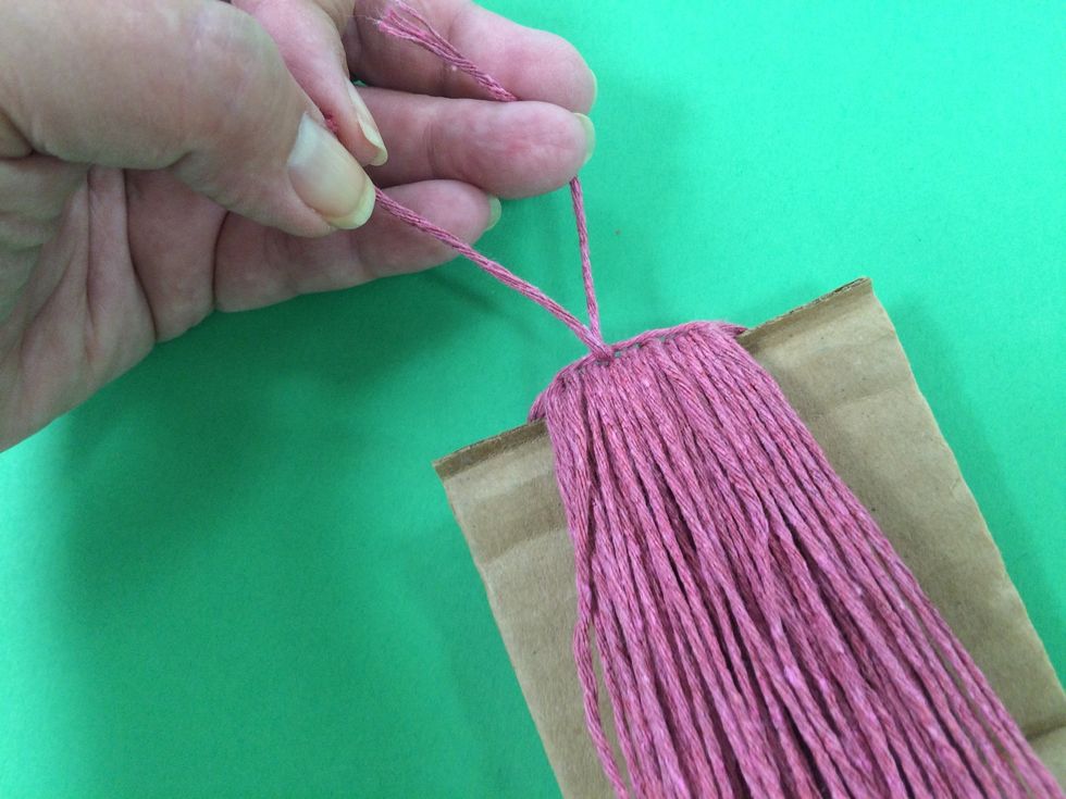 The knot will pull the yarns close together.