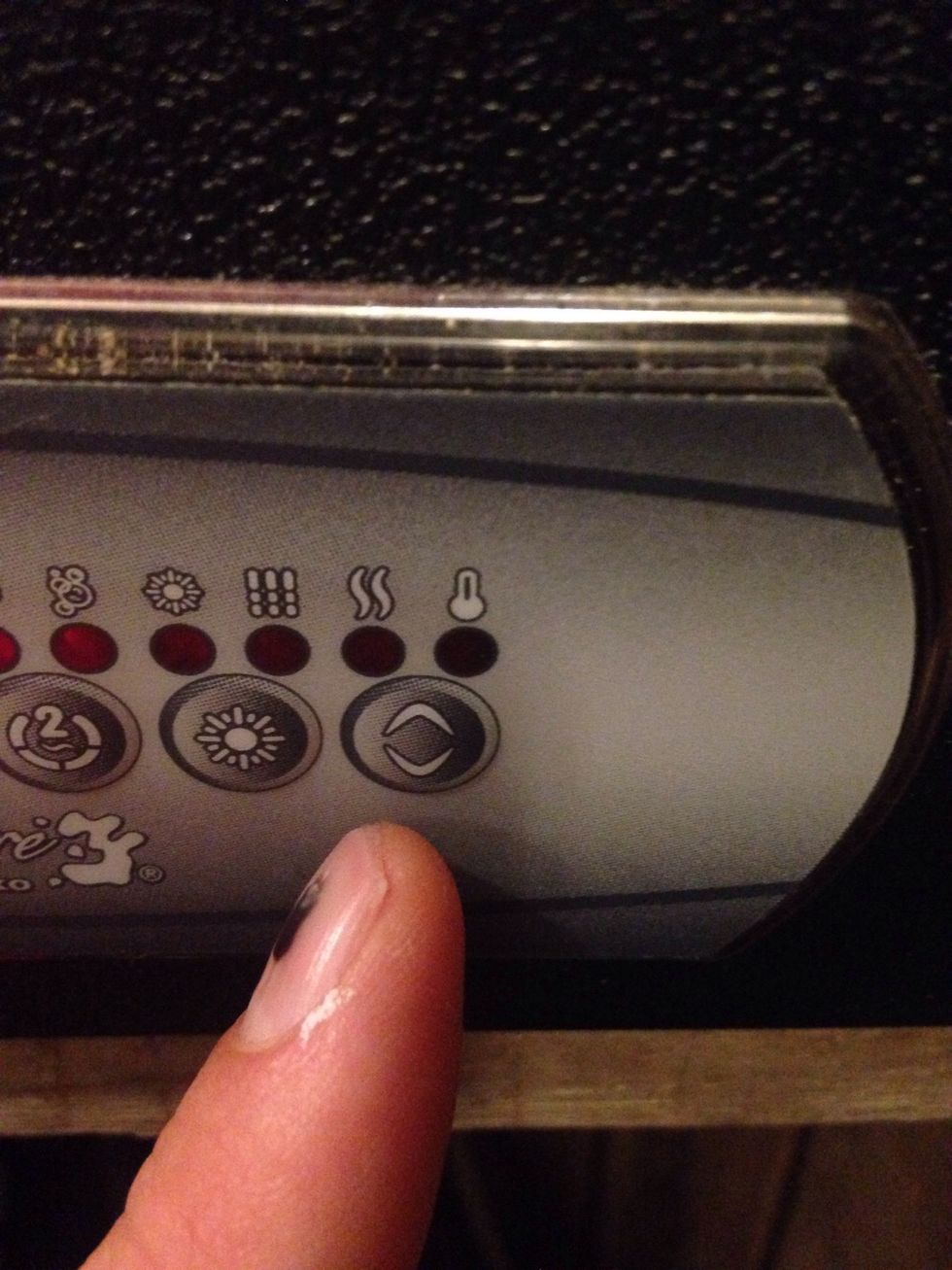 The last button turns the temperature up. It turns it down the next time you press it. Temperature changes take hours