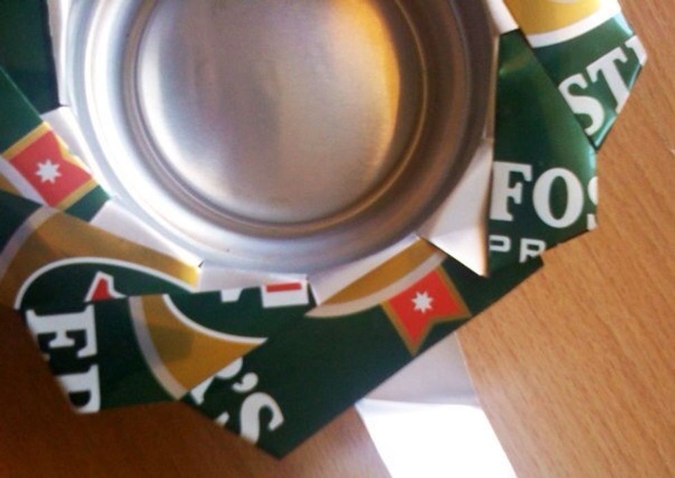 The last one is tricky & u really have tone extra careful not cut yourself or rip the strip. This one you'll have to push n wriggle into the by it & under the next. See next picture...