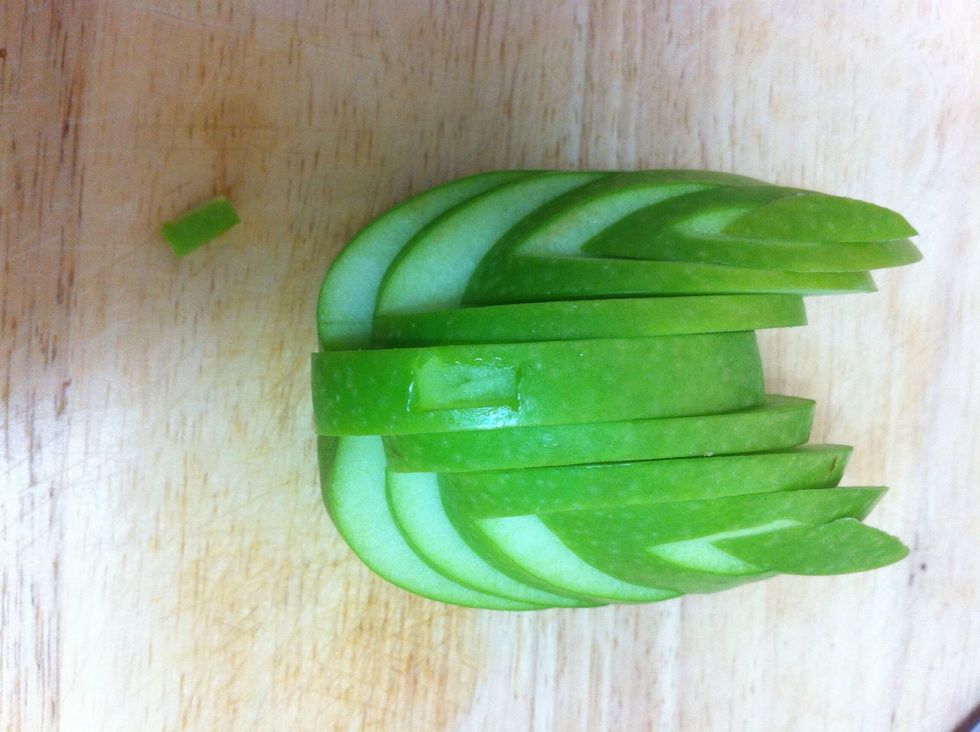 the last step is to cut a small piece from the middle of the apple in order to make room for the head and put it all together.