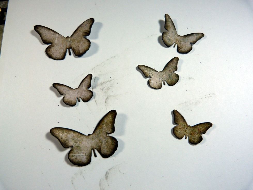 The left over butterflies from the Die of the Month I inked the edges with Distress Ink Walnut Stain.....