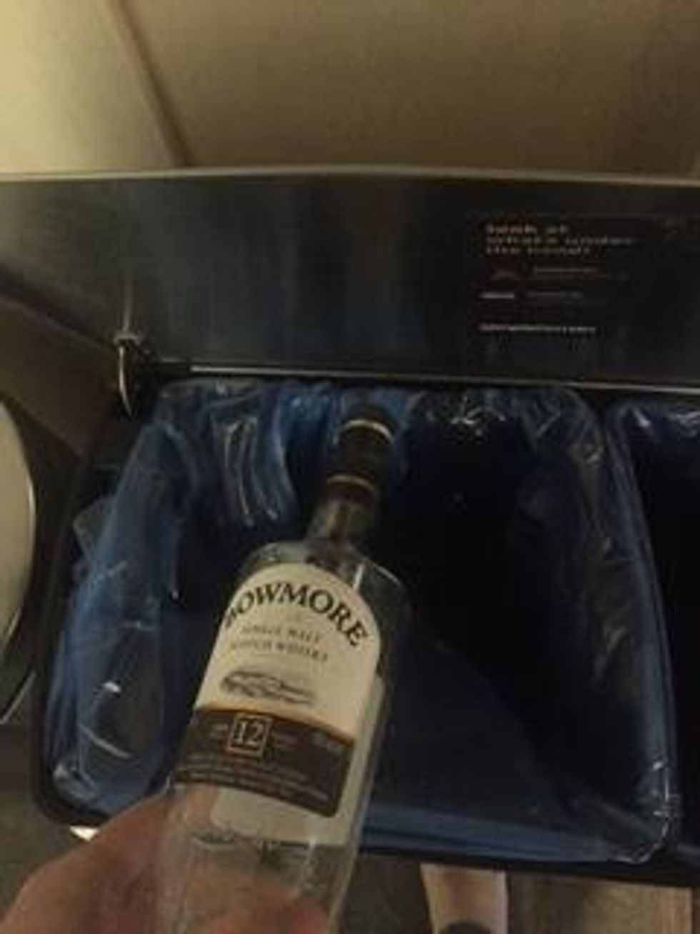 The left side of the large bin is for cans and bottles